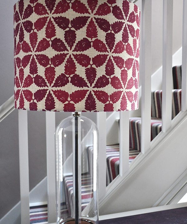 Detail shot of a red patterned lampshade in 'Maroc'.