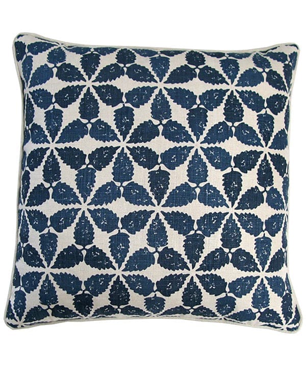 Indigo cushions in hand-printed linen with a Moroccan-inspired, tessellated, design.