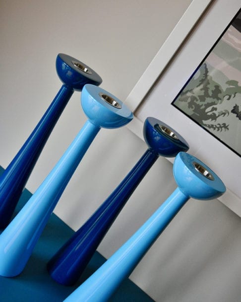 Coloured candlesticks in sky blue and teal.