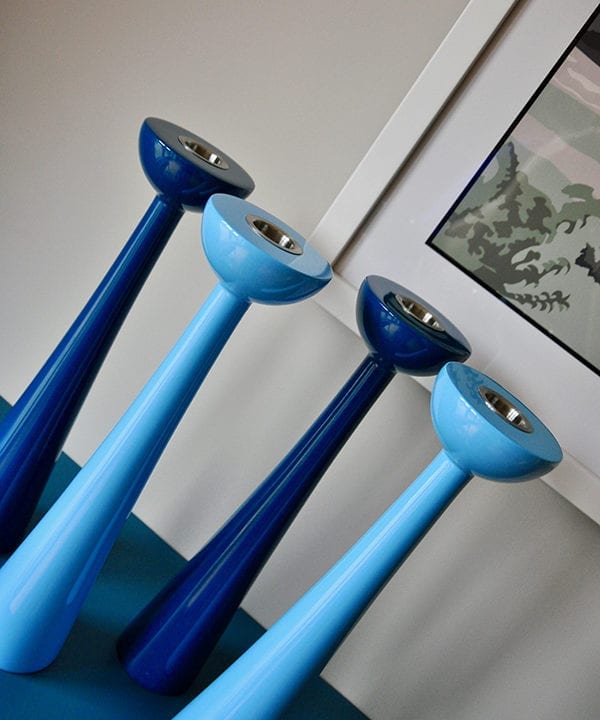 Coloured candlesticks in sky blue and teal.