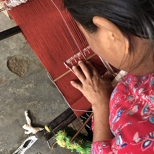 Hand-weaving the Nagaland-made cushions on a loom.