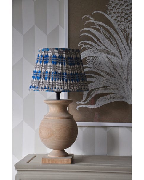 Putty and blue-hued, block print cotton lampshades available in various sizes.