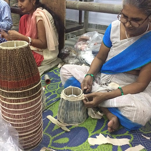 Handmade lampshades are in progress in India at one of Samarkand Design's suppliers.