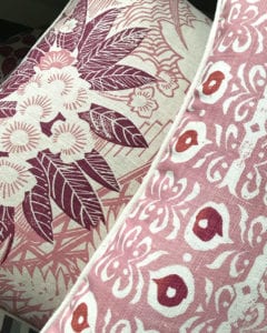 Rapture and Wright hand-printed pink linen cushions.