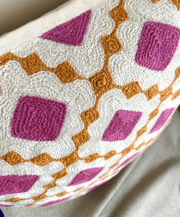 New in finds from Telescope Style are these Indian crewel work cushions in pink and orange.