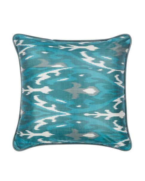 Cut out shots of teal ikat cushions from Telescope Style.