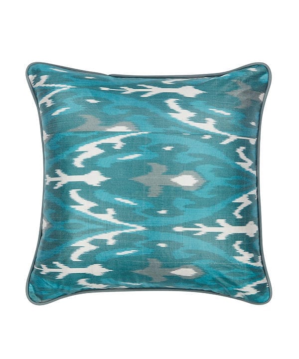 Cut out shots of teal ikat cushions from Telescope Style.