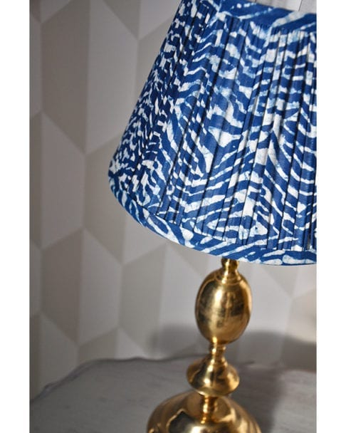 Indian block-print lampshade in wave design in pleated, cotton.