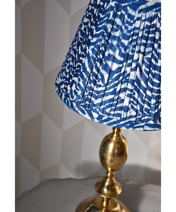 Indian block-print lampshade in wave design in pleated, cotton.