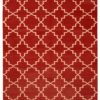 Deep red dhurrie rug with a cream lattice design.