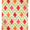 Pink and orange rug with vibrant diamond motif, handmade in India for Telescope Style.