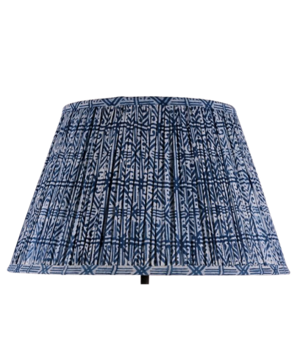 A block-print indigo, gathered-cotton lampshade.