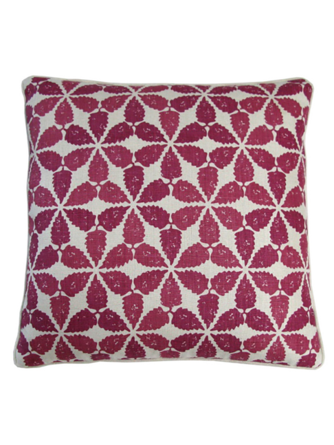 A cranberry red patterned cushion in Moroccan, hand-printed linen.