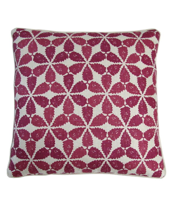 A cranberry red patterned cushion in Moroccan, hand-printed linen.