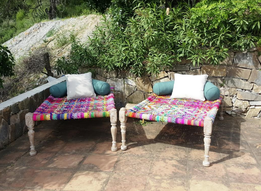 Colourful Indian 'Charpoy' day beds made from re-purposed saree fabric available from Mahout Lifestyle.