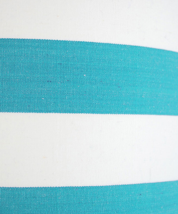 Turquyoise blue deckchair-striped drum shade detail.