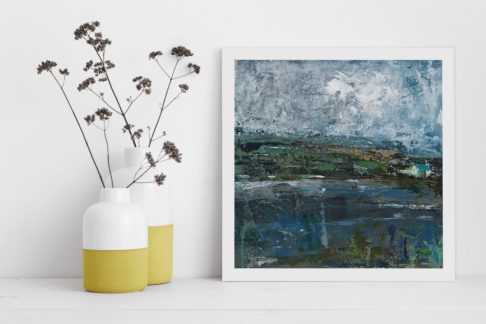 Irish landscapes art by Emma Tweedie, framed and styled next to colourful yellow jars filled with dried meadow flowers.