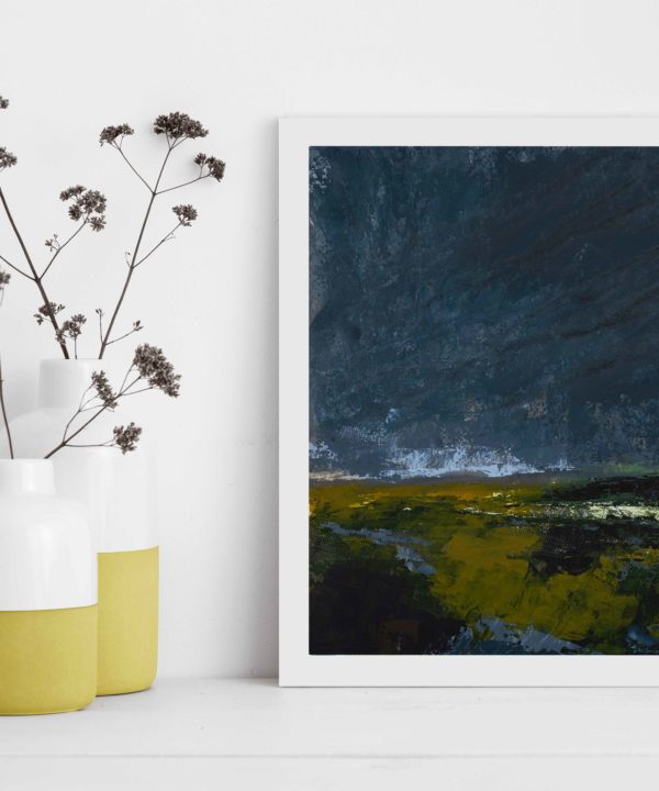 Framed Irish art print Dusk Is Here styled next to yellow pots filled with meadow flowers.