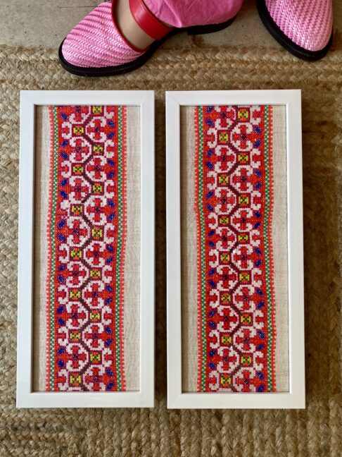 Portrait framed fabric wall art showcasing vintage embroidered textiles from Thailand.