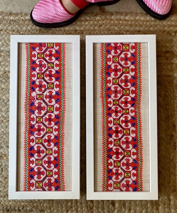 Portrait framed fabric wall art showcasing vintage embroidered textiles from Thailand.