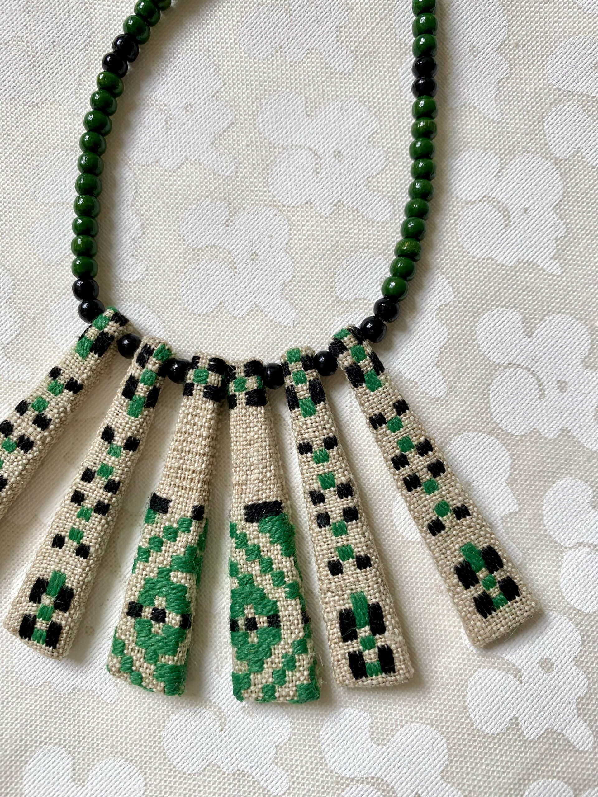 Green bib necklace handmade from vintage textiles