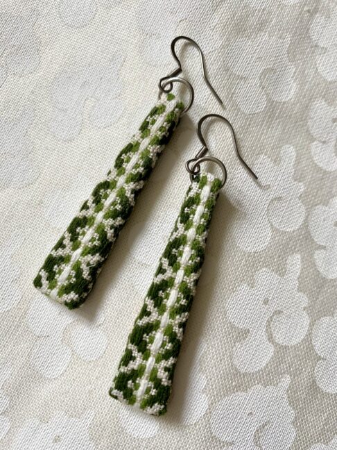 Green drop earrings handmade from vintage Slovenian embroidered textiles.