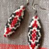 Handmade embroidered earrings in vintage embroidered textiles from Slovenia.