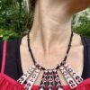 Summer jewellery in red and black, handmade from vintage embroidered fabric.