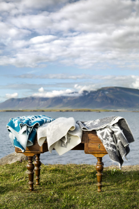 Nordic bind rune blankest styled on furniture placed in the great outdoors.