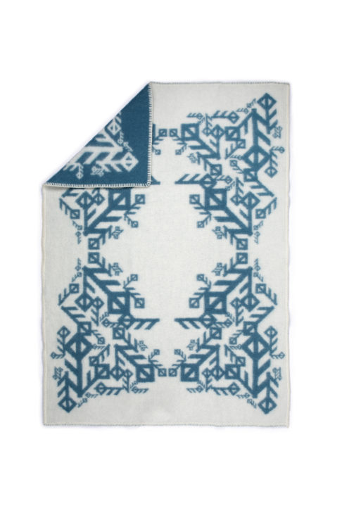 A reversible blue and white Icelandic bind rune blanket.