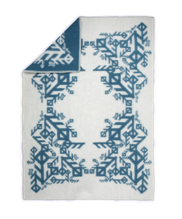 A reversible blue and white Icelandic bind rune blanket.