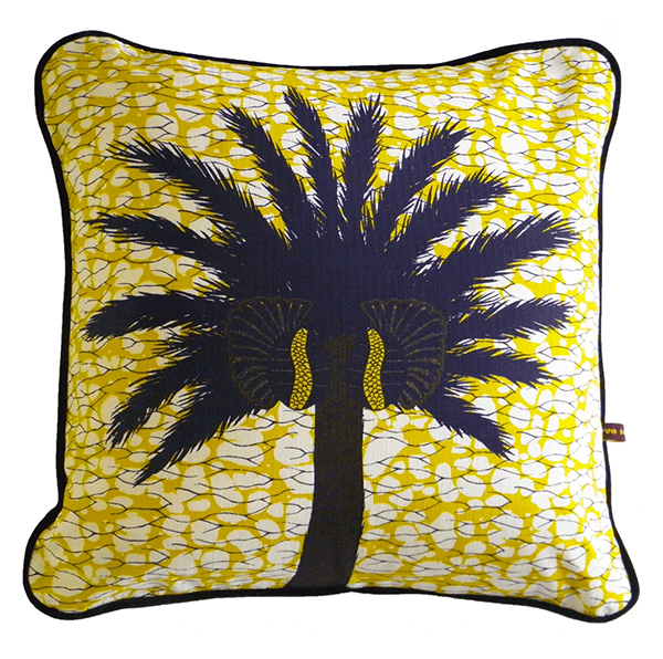 A palm print cushion in deep aubergine and yellow by Eva Sonaike.