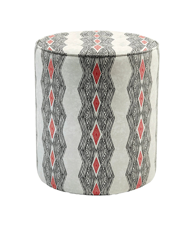 African fabric print footstool in black and red tribal stripe design.