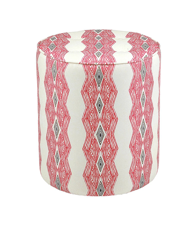 A red pouffe with African geometric stripe fabric.