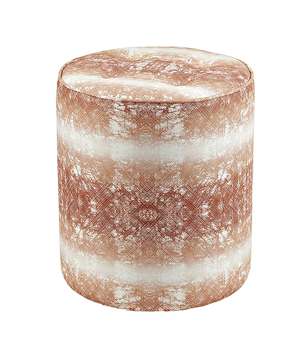 A copper-coloured, upholstered footstool with intricate, African-inspired, print detail and faded horizontal bands.