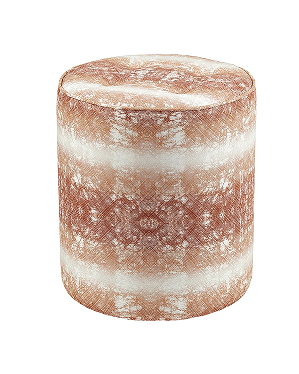 A copper-coloured, upholstered footstool with intricate, African-inspired, print detail and faded horizontal bands.