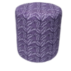 A purple upholstered dressing table stool with a tropical palm print.