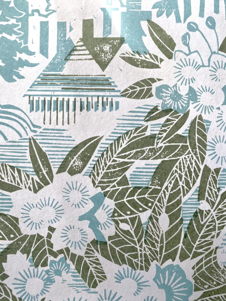 An elegant, country house wallpaper with an Arts & Crafts feel by Rapture and Wright, in a duck egg blue and khaki green colour way.