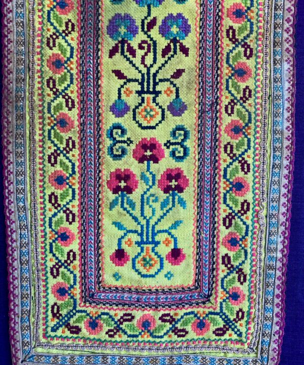 A Thai Hmong textile panel originally embroidered for traditional costumes.