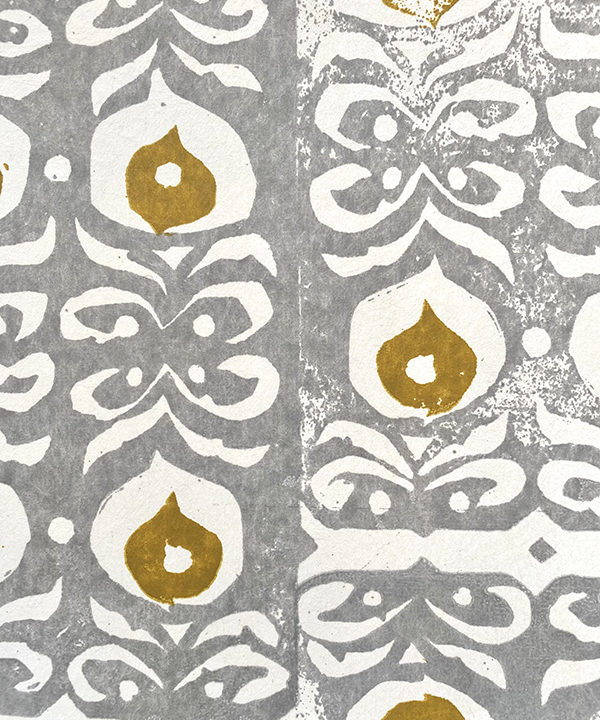 Chic, mustard and grey wallpaper, hand-printed in England but inspired by ceramic detailing from the Middle East.