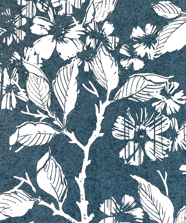 Wallpaper in indigo detail showing espaliered fruit trees in a walled garden.