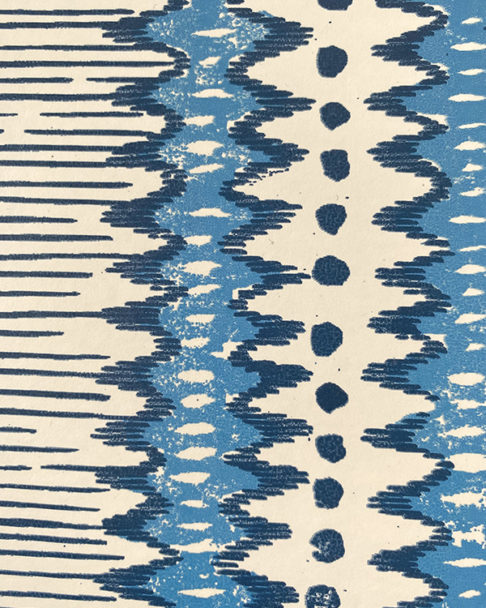 Deatila of a blue and white zig-zag stripe wallpaper.