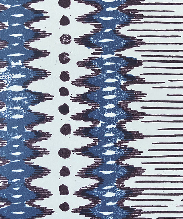 Indigo wallpapers detail. Aubergine tones add warmth to this West African-inspired design.