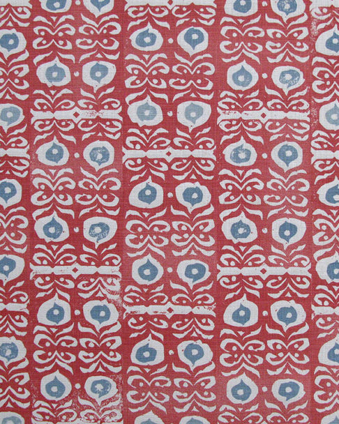 Red patterned cushions fabric 'Iznik' hand-printed linen - a Middle Eastern-inspired design.