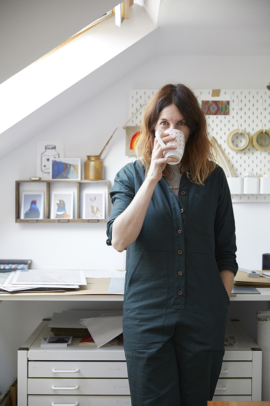 Animal wildlife portrait artist Talia Giles relaxing in her studio.