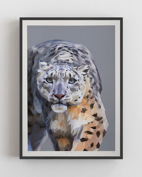 Snow leopard wall art framed with a slim black frame.