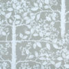 Grey garden wallpaper detail showing espaliered fruit trees.