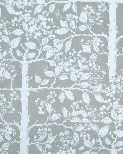 Grey garden wallpaper detail showing espaliered fruit trees.