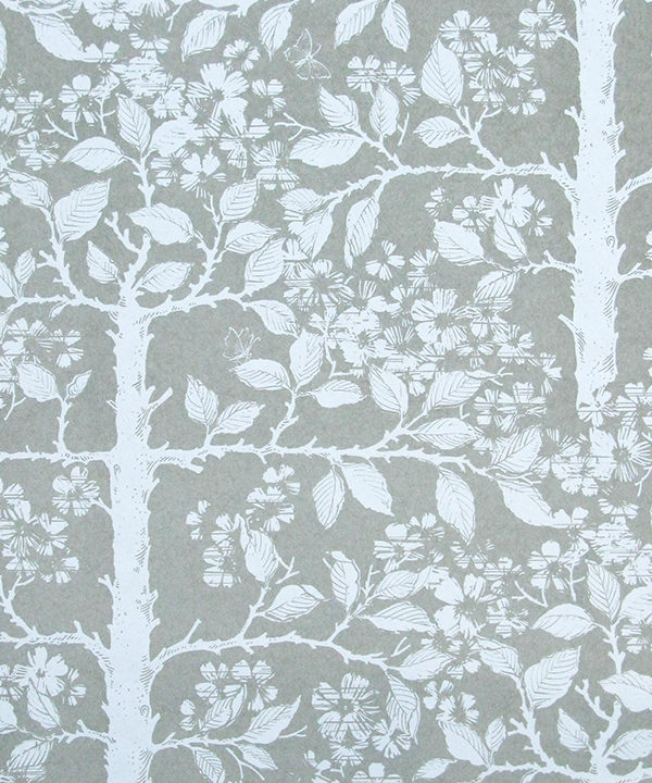 Grey garden wallpaper detail showing espaliered fruit trees.