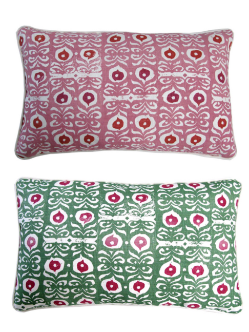 Iznik print patterned linen lumbar cushions in raspberry pinks or grass green and red.